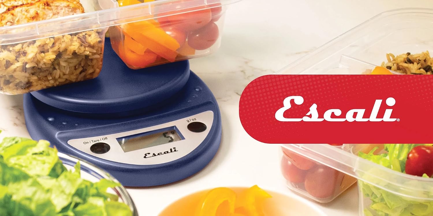 Escali Primo digital kitchen scale with fresh meal-prep ingredients on a marble countertop
